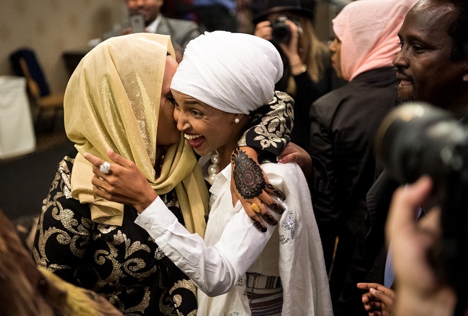 greeted supporter as she arrived at her victory party Tuesday night at the Courtyard Marriott Downtown. ] (AARON LAVINSKY/STAR TRIBUNE) aaron.lavinsky@startribune.com Minneapolis community activist Ilhan Omar won a historic election, becoming the nations first Somali-American elected to a statehouse. Her election night watch party was held Tuesday, Nov. 8, 2016 at the Courtyard Minneapolis Downtown.